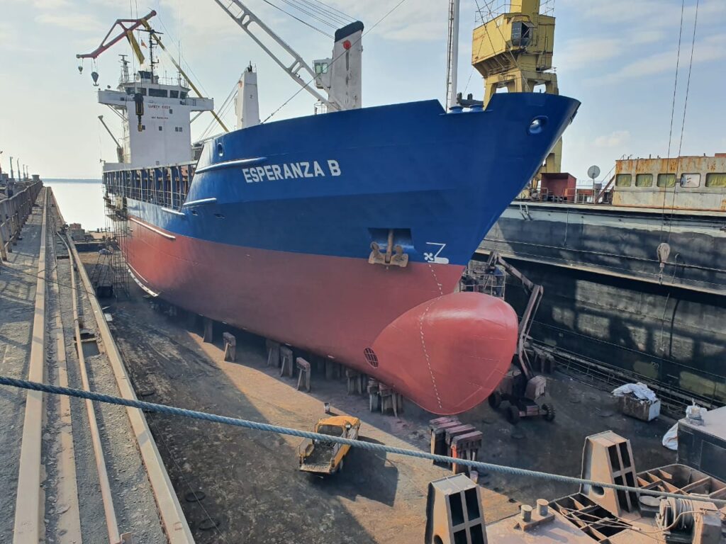 A vessel in drydock
Shipyard inspection
Surveyor inspecting a vessel
Vessel under repair
Shipyard / crane / drydock
A vessel being prepared for service